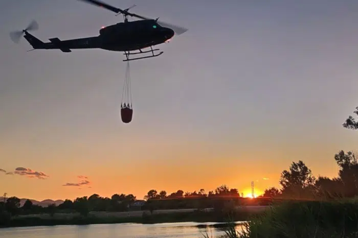 FOTO | Piloti OS BiH spasili život ženi, a potom nastavili gasiti požar u Grudama